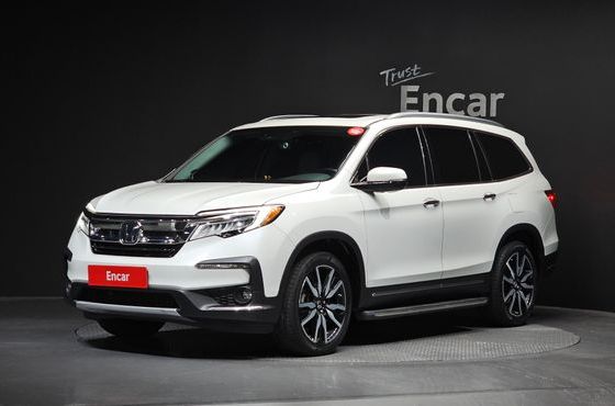 Honda Pilot 3.5 Elite — пробег 125 497 км — фото 1 из 5