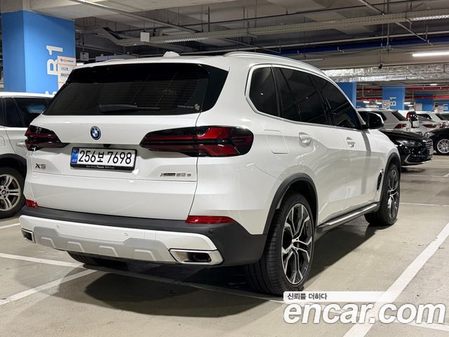 BMW X5 xDrive 50e xLine — пробег 14 028 км — фото 2 из 5