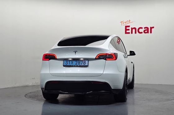 Tesla Model Y Standard Range RWD — пробег 80 335 км — фото 4 из 5