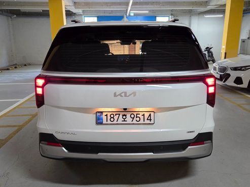 Kia Carnival HEV 9 seater Prestige — пробег 1 100 км — фото 4 из 5