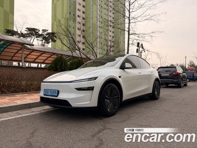 Tesla Model Y Long Range AWD — пробег 25 676 км — фото 1 из 5