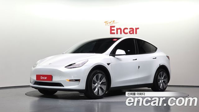 Tesla Model Y Standard Range RWD — пробег 101 191 км — фото 1 из 5