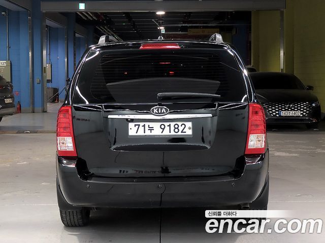 Kia Carnival Grand Carnival GLX Deluxe — пробег 202 391 км — фото 3 из 5