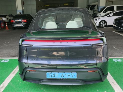 Tesla Model Y L Long Range AWD — пробег 883 км — фото 2 из 5
