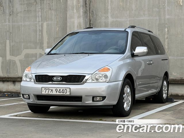 Kia Carnival Grand Carnival GLX Premium — пробег 142 326 км — фото 1 из 5