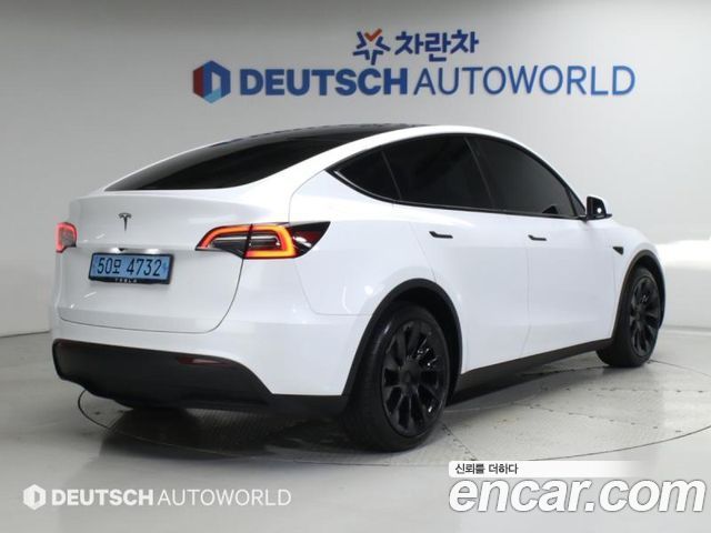Tesla Model Y RWD — пробег 9 353 км — фото 2 из 5