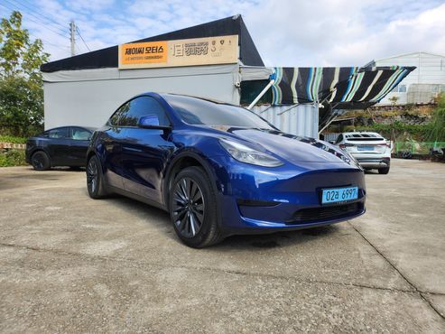 Tesla Model Y RWD — пробег 60 822 км — фото 2 из 5
