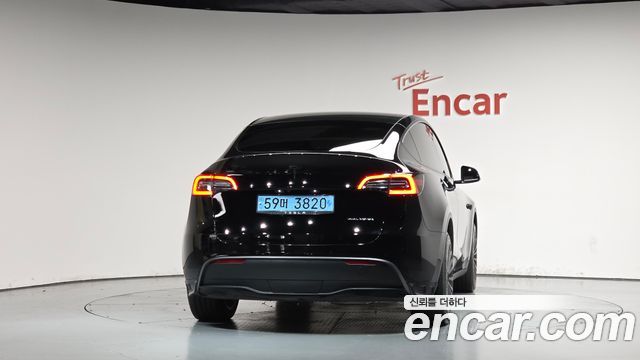 Tesla Model Y Long Range AWD — пробег 72 384 км — фото 4 из 5