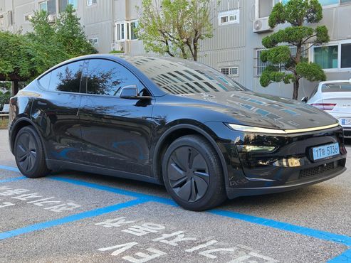 Tesla Model Y Long Range AWD — пробег 24 500 км — фото 3 из 5