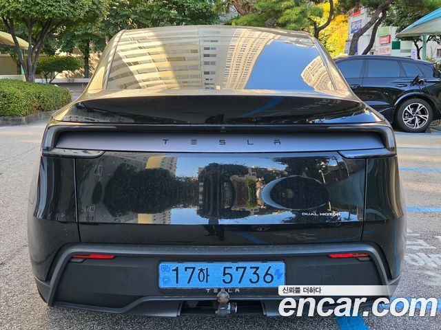 Tesla Model Y Long Range AWD — пробег 24 500 км — фото 4 из 5
