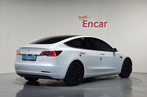 Tesla Model 3 Long Range AWD — пробег 64 946 км — фото 2 из 5
