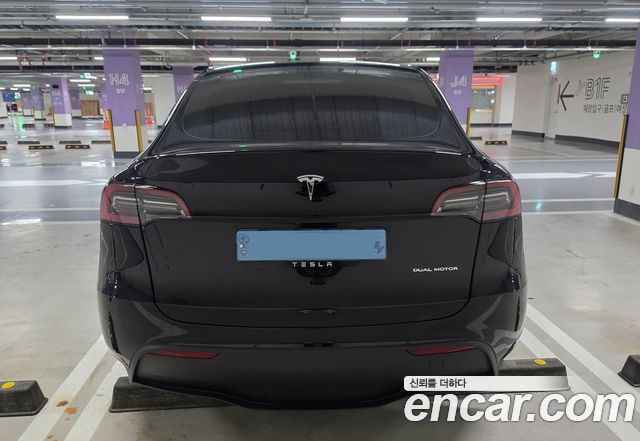 Tesla Model Y RWD — пробег 38 000 км — фото 4 из 5