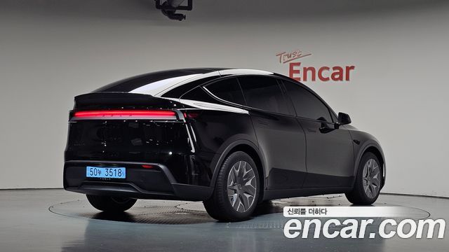 Tesla Model Y L Long Range AWD — пробег 59 км — фото 2 из 5
