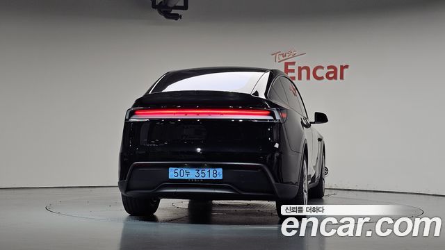 Tesla Model Y L Long Range AWD — пробег 59 км — фото 4 из 5