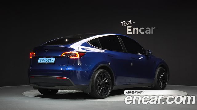 Tesla Model Y Long Range AWD — пробег 52 604 км — фото 2 из 5