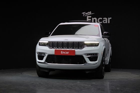 Jeep Cherokee 4xe Summit Reserve — пробег 64 097 км — фото 3 из 5