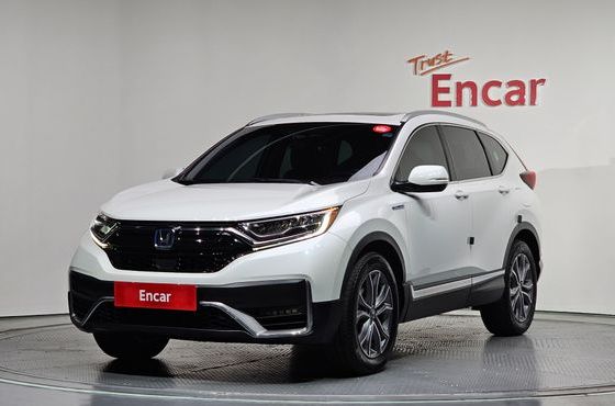 Honda CR-V 2.0 Hybrid Touring 4WD — пробег 66 562 км — фото 1 из 5