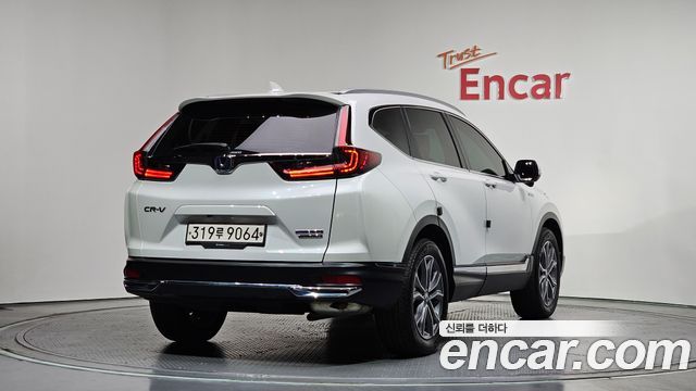 Honda CR-V 2.0 Hybrid Touring 4WD — пробег 66 562 км — фото 2 из 5
