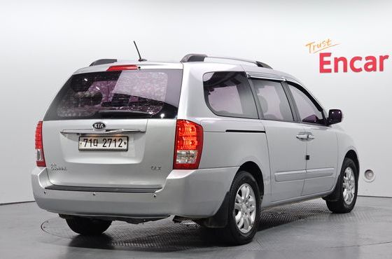 Kia Carnival Grand Carnival GLX Premium — пробег 239 087 км — фото 2 из 5