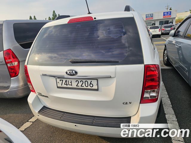 Kia Carnival Grand Carnival GLX Premium — пробег 255 000 км — фото 4 из 5