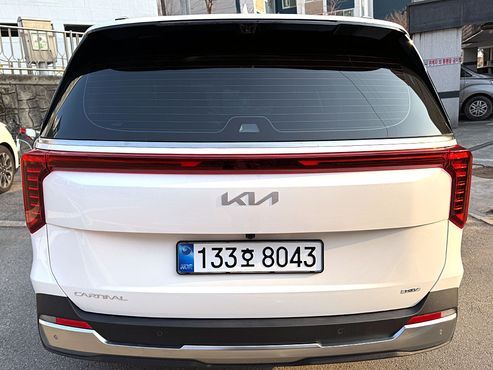 Kia Carnival HEV 9seater Signature — пробег 2 900 км — фото 4 из 5