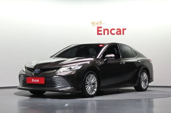 Toyota Camry 2.5 XLE Hybrid — пробег 167 143 км — фото 1 из 5