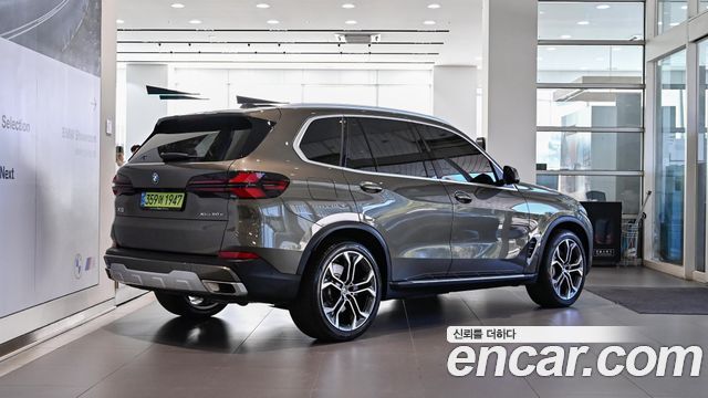 BMW X5 xDrive 50e xLine — пробег 8 751 км — фото 4 из 5