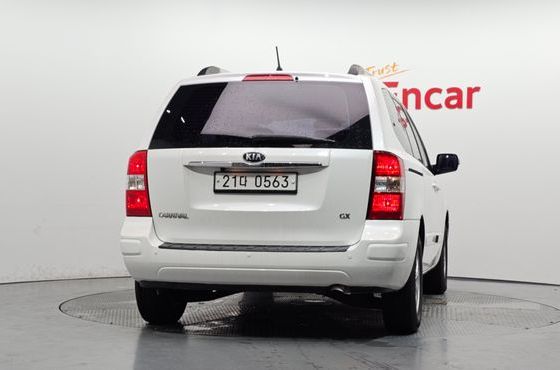 Kia Carnival New Carnival GX Standard — пробег 312 713 км — фото 4 из 5