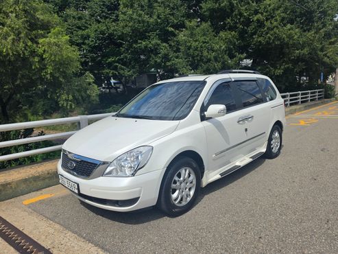 Kia Carnival New Carnival GLX High-Deluxe — пробег 128 254 км — фото 2 из 5