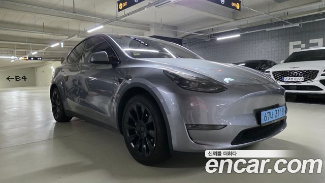 Tesla Model Y Long Range AWD — пробег 56 400 км — фото 1 из 5