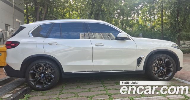 BMW X5 xDrive 50e xLine — пробег 33 980 км — фото 4 из 5