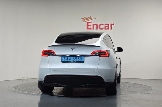 Tesla Model Y RWD — пробег 35 569 км — фото 4 из 5