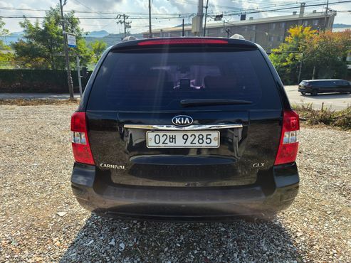 Kia Carnival Grand Carnival GLX Luxury — пробег 244 531 км — фото 4 из 5