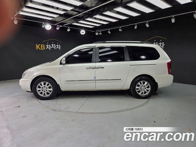 Kia Carnival New Carnival GX Standard — пробег 195 515 км — фото 3 из 5