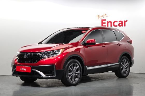 Honda CR-V 1.5 Touring 4WD — пробег 84 170 км — фото 1 из 5