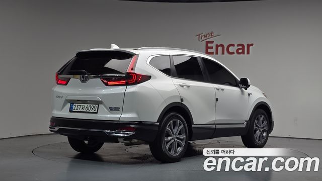 Honda CR-V 2.0 Hybrid Touring 4WD — пробег 28 627 км — фото 2 из 5
