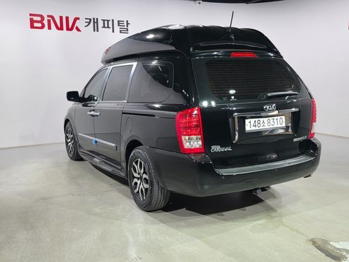 Kia Carnival Grand Carnival HI Limousine GLX Premium — пробег 235 000 км — фото 4 из 5