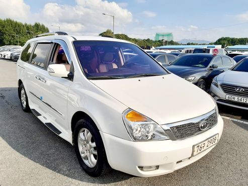 Kia Carnival Grand Carnival GLX Premium — пробег 150 000 км — фото 3 из 5