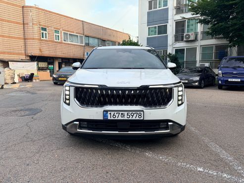 Kia Carnival HEV 9seater Signature — пробег 3 700 км — фото 1 из 5