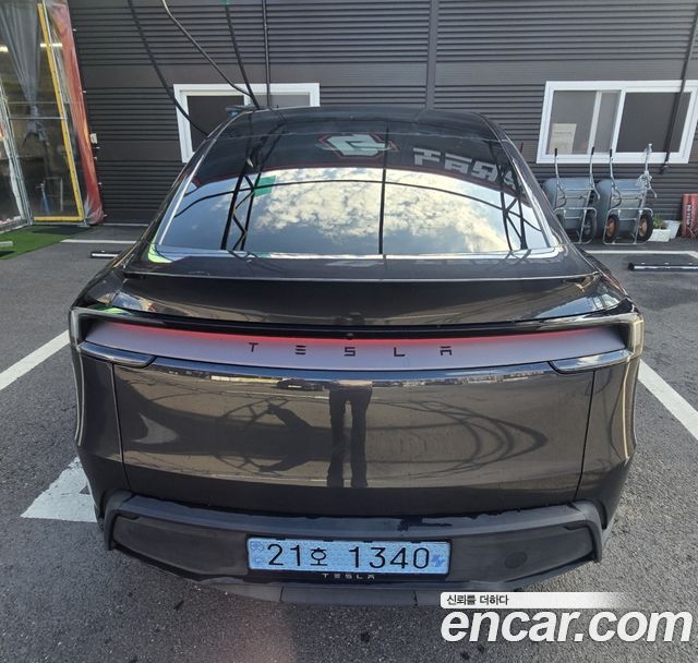 Tesla Model Y Premium RWD — пробег 24 000 км — фото 4 из 5
