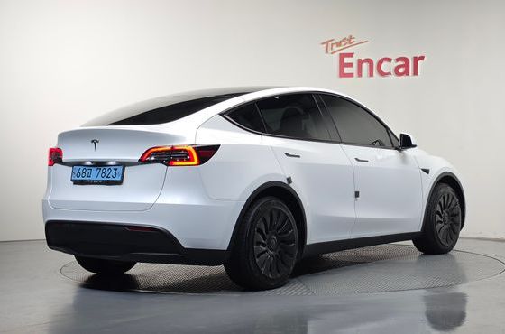 Tesla Model Y RWD — пробег 58 995 км — фото 2 из 5