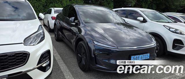 Tesla Model Y Premium RWD — пробег 1 365 км — фото 2 из 5