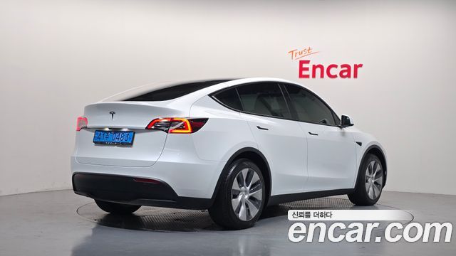Tesla Model Y RWD — пробег 49 828 км — фото 2 из 5