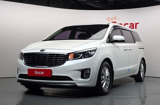 Kia Carnival 11-seater Deluxe — пробег 101 896 км — фото 1 из 5