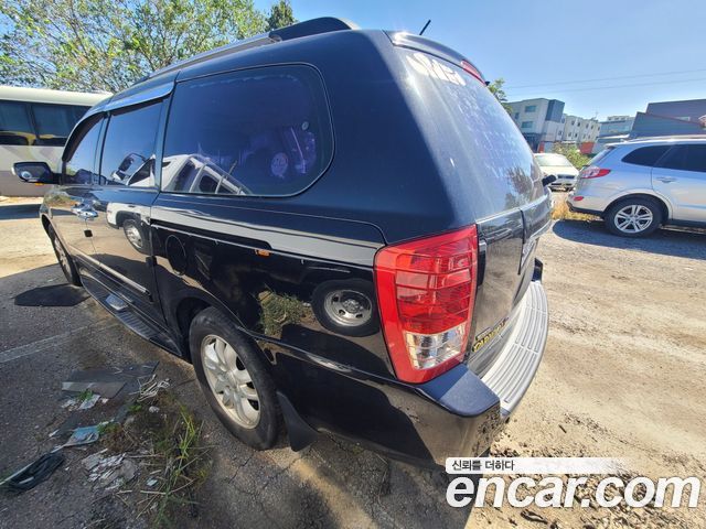 Kia Carnival Grand Carnival GLX Deluxe — пробег 245 823 км — фото 4 из 5