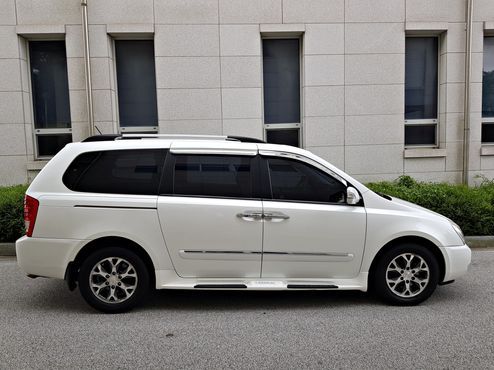 Kia Carnival Grand Carnival GLX Premium — пробег 120 000 км — фото 4 из 5
