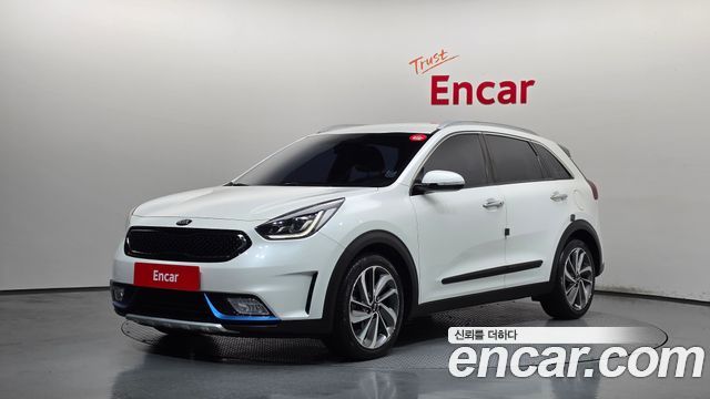 Kia Niro Prestige — пробег 144 974 км — фото 1 из 5