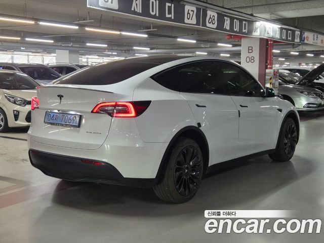 Tesla Model Y Long Range AWD — пробег 90 157 км — фото 3 из 5