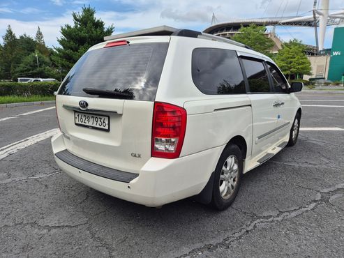 Kia Carnival Grand Carnival GLX Luxury — пробег 209 700 км — фото 4 из 5