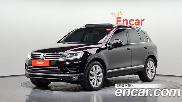 Volkswagen Touareg V6 3.0 TDI Bluemotion Premium 7P5 — пробег 237 696 км — фото 1 из 5